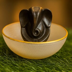 Pyrite ganesh with selenite bowl